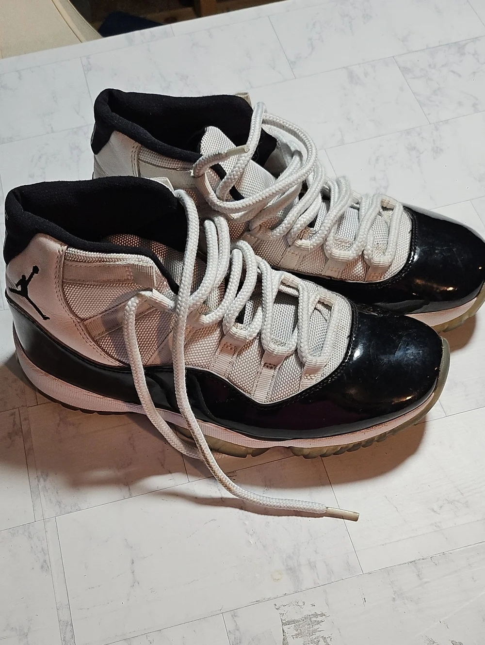 Jordan Women’s High-Top Sneakers in Black and White